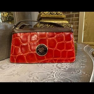 Dooney & Bourke wristlet. Super cute used once.  MAKE AN OFFER